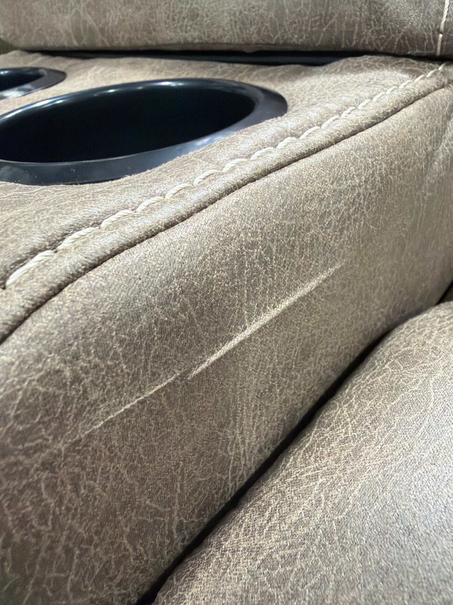 AH101 Stoneland Reclining Power Loveseat with Console(Missing charger. Has a small cut)