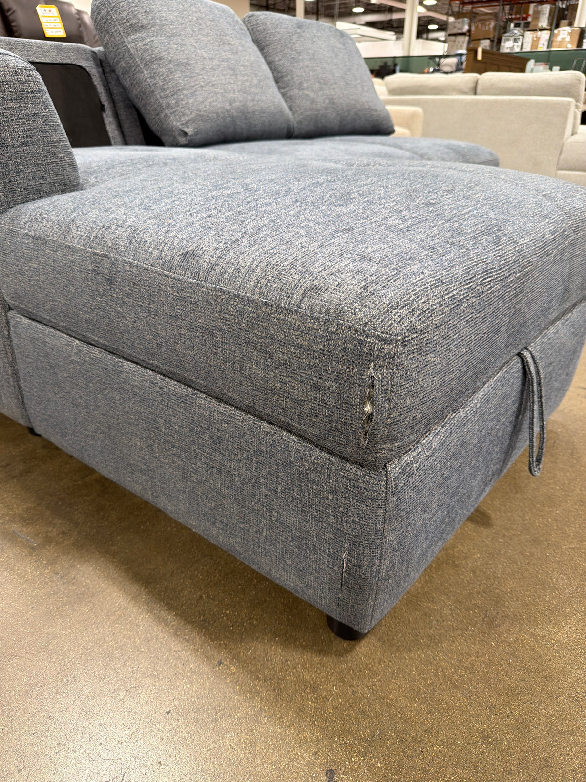 BJF250474 Laguna Sectional with Pop-Up Sleeper & Storage Chaise(One part is slightly cut)
