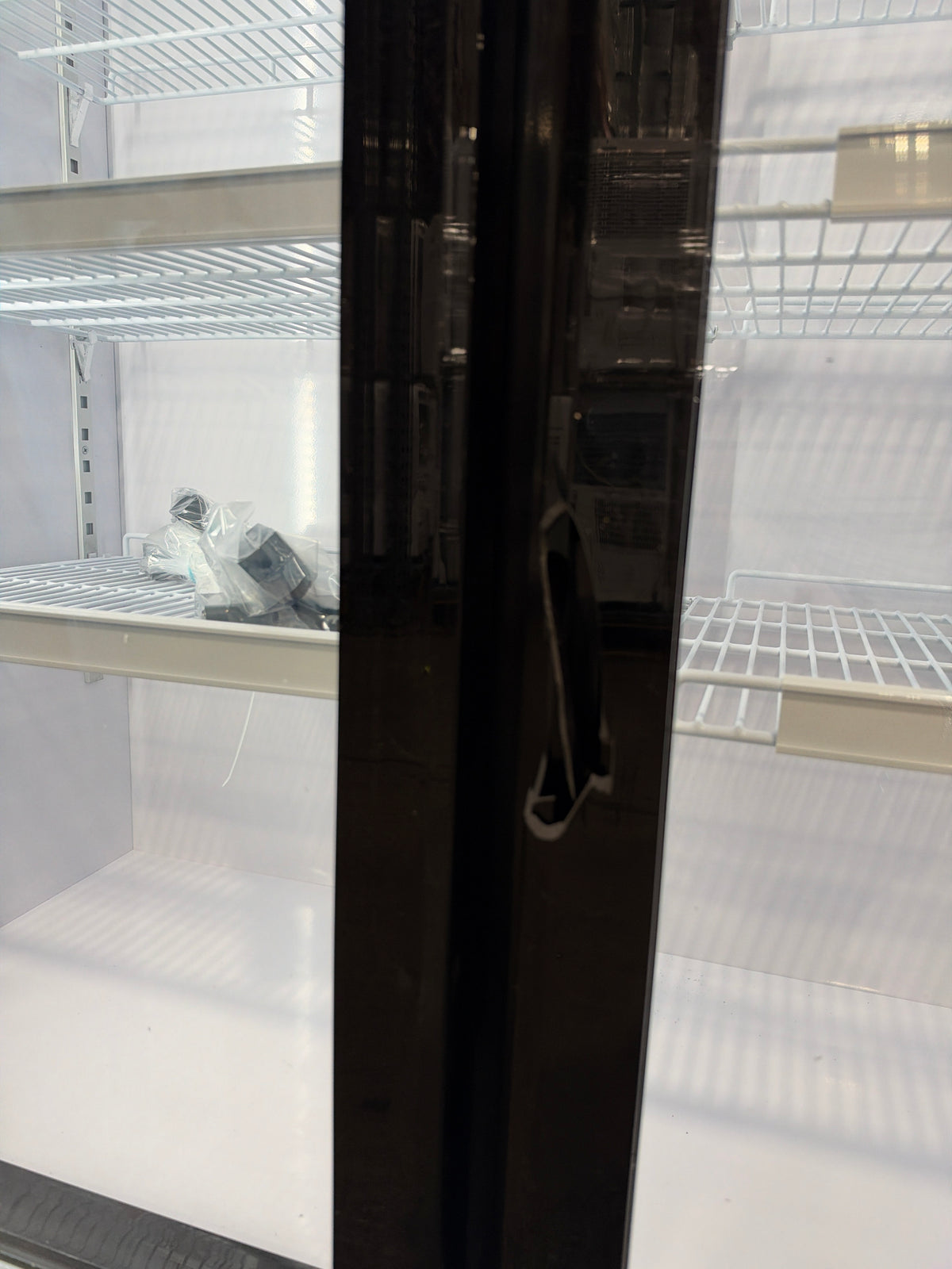 AC260395 Frigidaire 71 in. 49 cu. ft. Commercial Glass Triple Door Display Fridge (Black) - FCCB4916(black trim is broken)